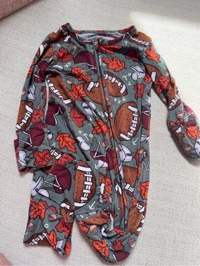 Fall football onesie. Olive Green Footed One-Piece with Football & Leaf Motif